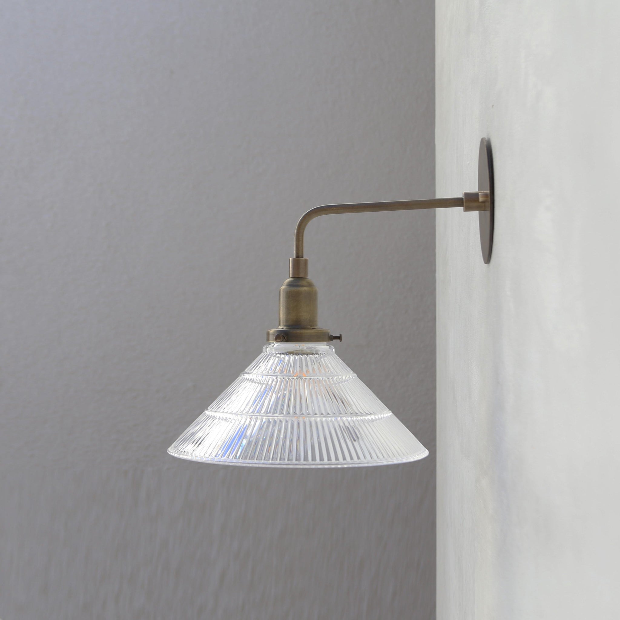 One-Light Industrial Wall Sconce with Ribbed Clear Glass Shade