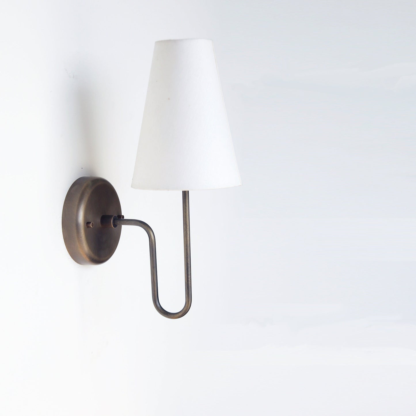 One-Light Linen Shade Wall Sconce with Curved Brass Arm