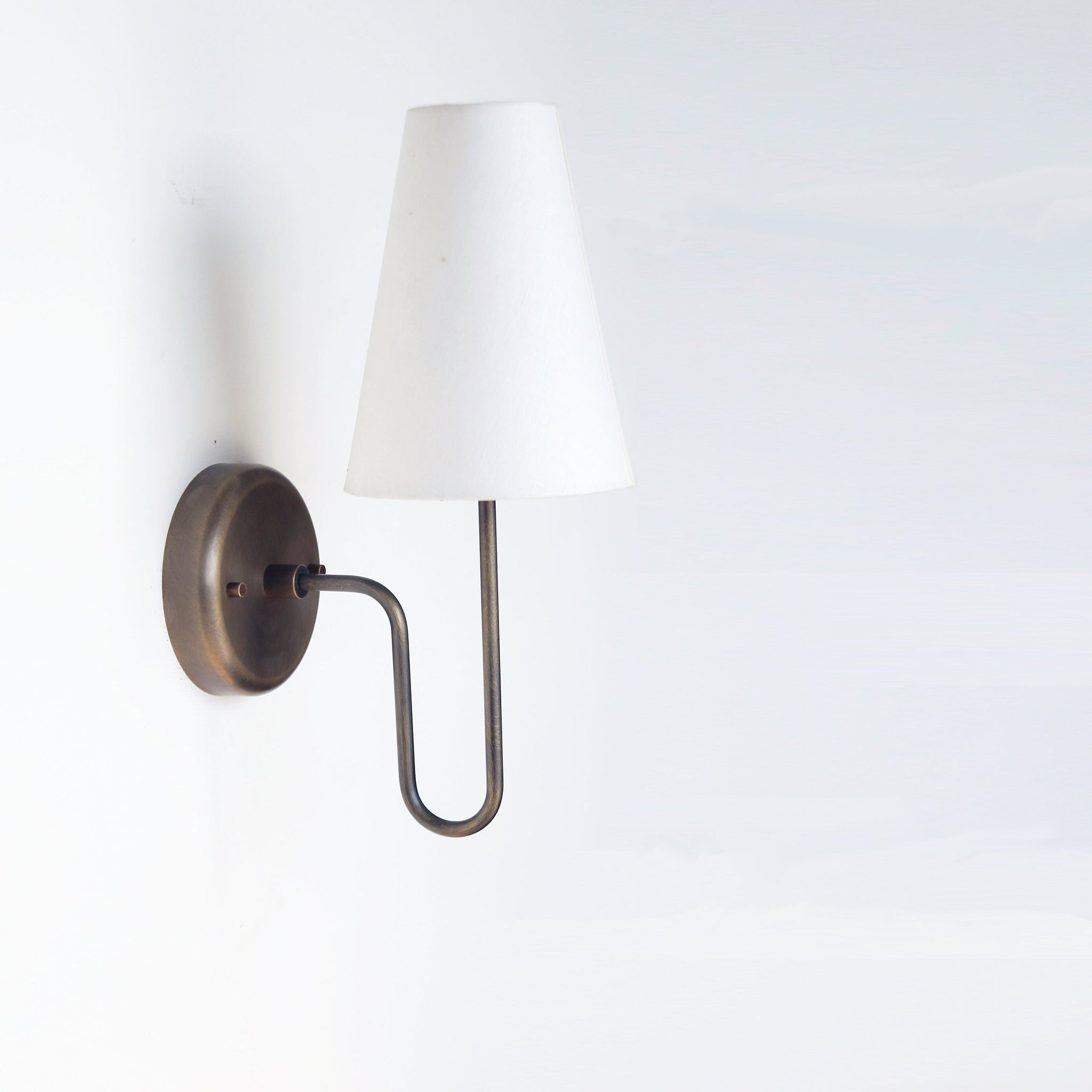 One-Light Linen Shade Wall Sconce with Curved Brass Arm