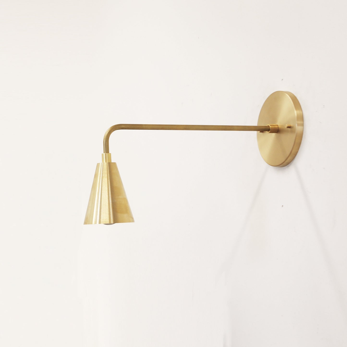 One-Light Long Arm Wall Sconce with Small Brass Cone