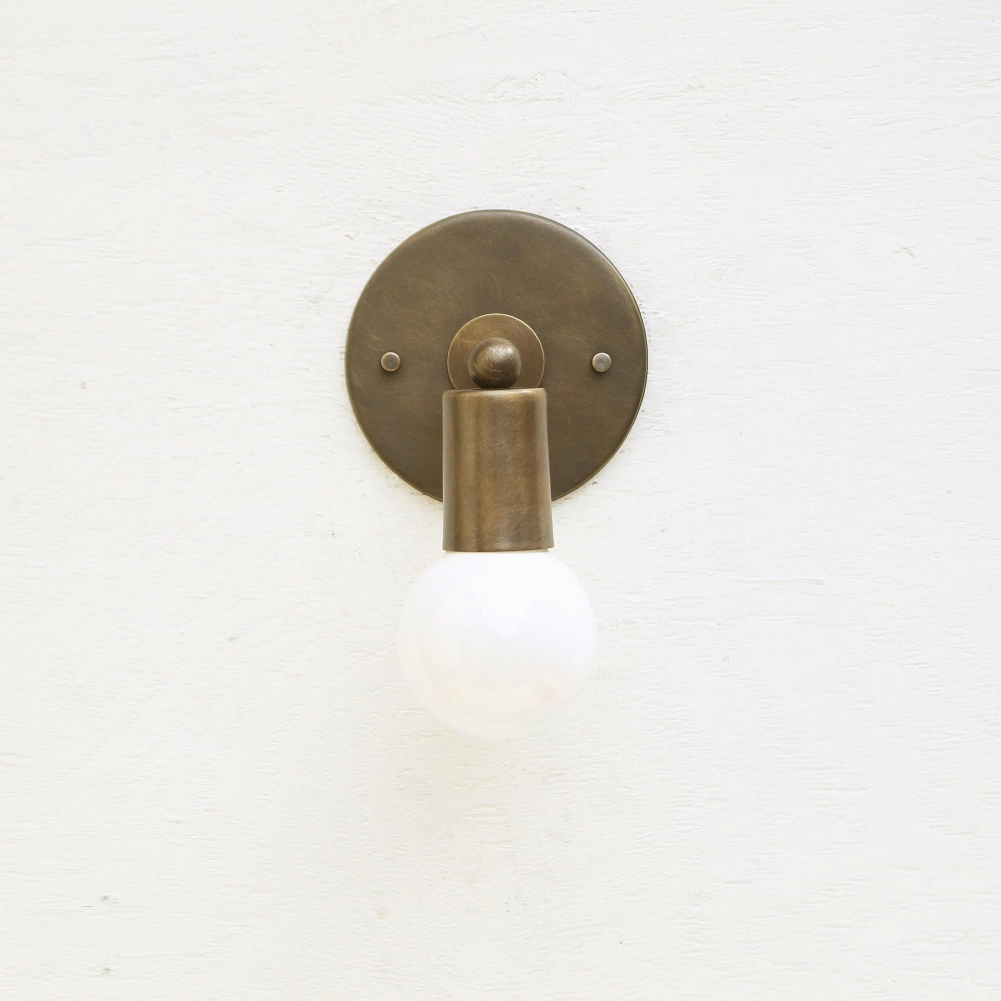 One-Light Minimal Brass Wall Sconce with Angled Socket