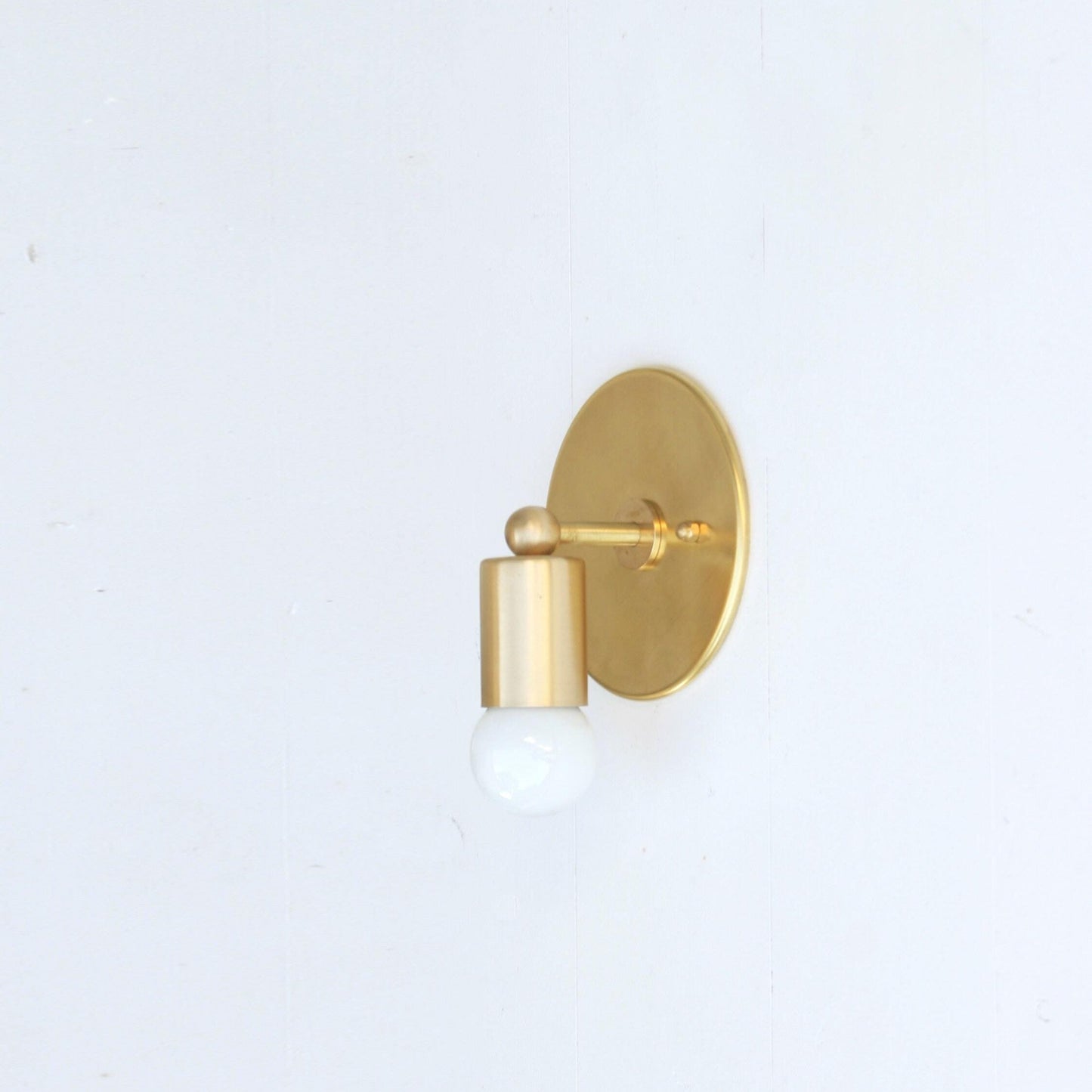 One-Light Minimal Brass Wall Sconce with Angled Socket