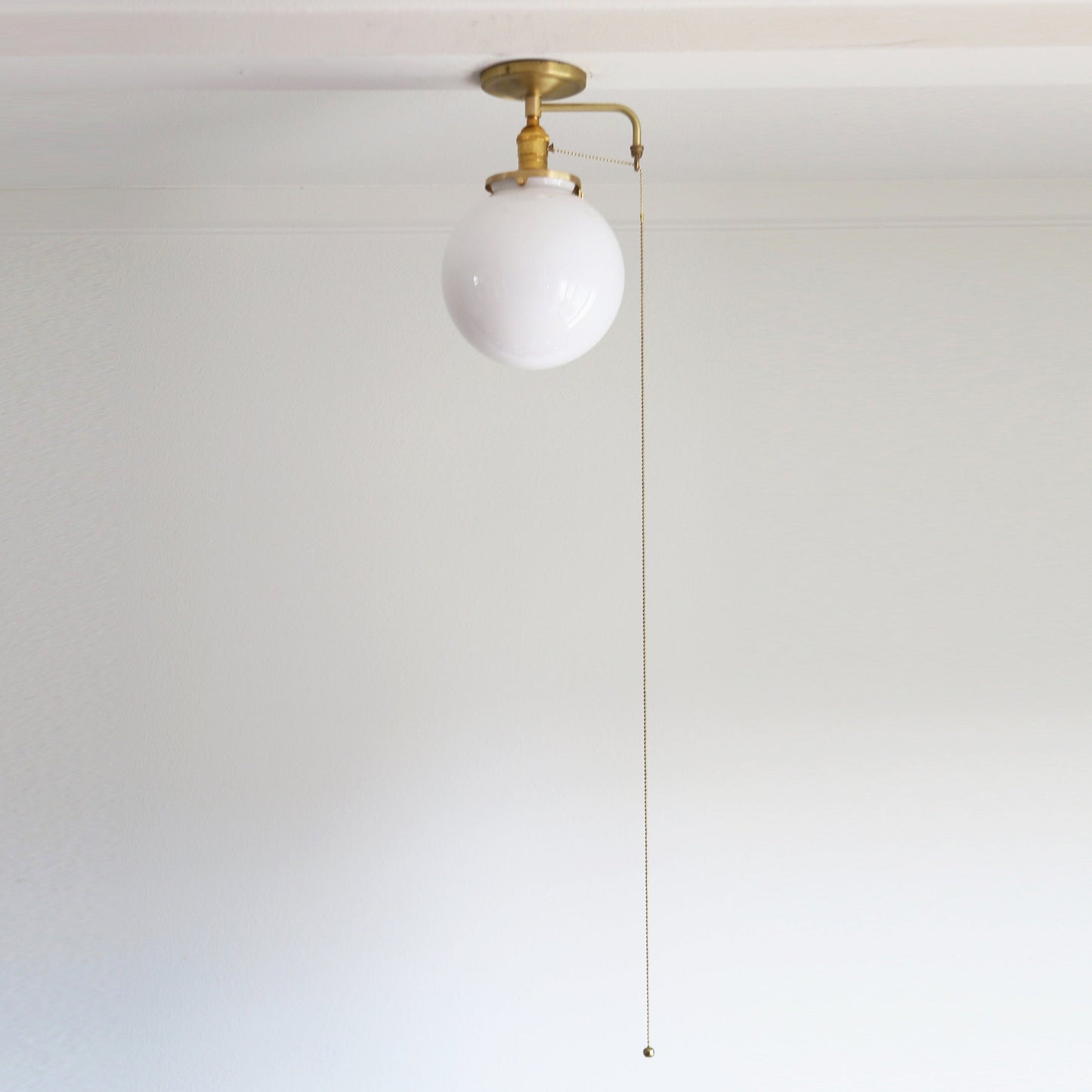 One-Light Opal Globe Flush Mount Ceiling Light with Pull Chain