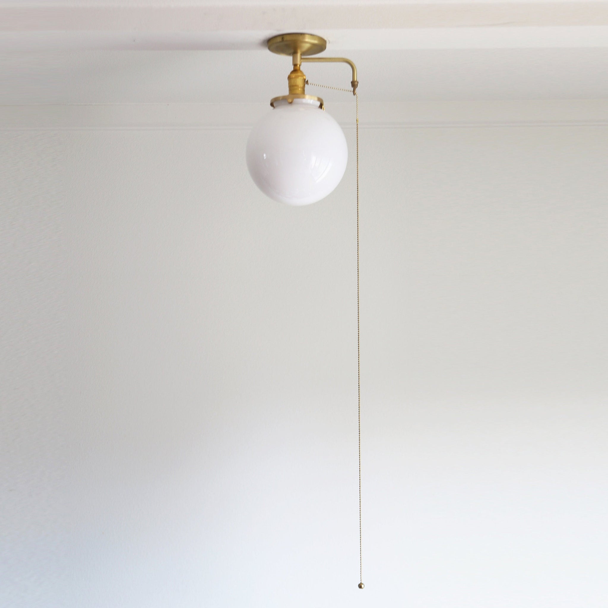One-Light Opal Globe Flush Mount Ceiling Light with Pull Chain