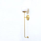 One-Light Opal Globe Wall Sconce with Long Brass Stem