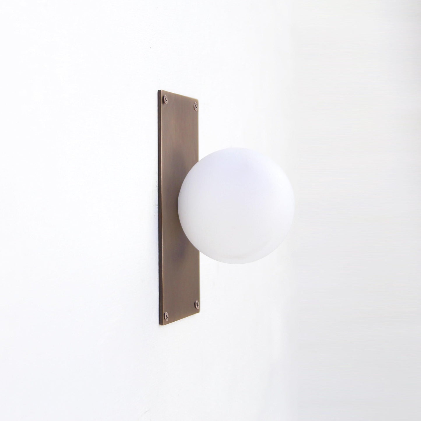 One-Light Opal Globe Wall Sconce with Rectangular Backplate