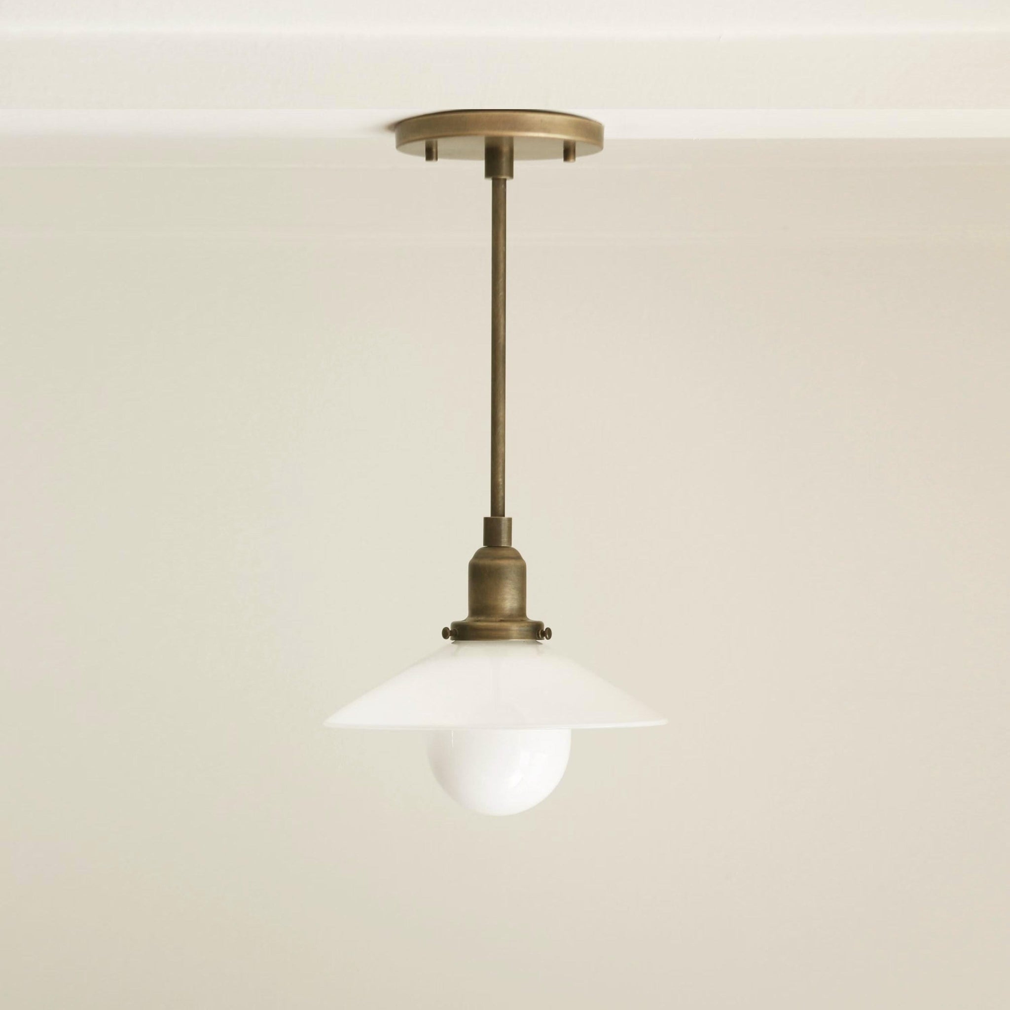One-Light Pendant with Opal Glass Cone Shade