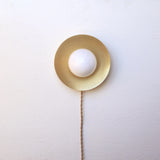 One-Light Plug-In Disc Wall Sconce with Opal Globe