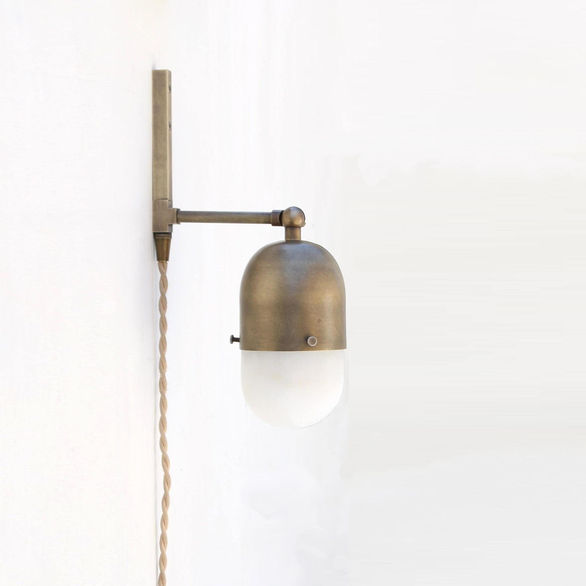 One-Light Plug-In Sconce with Brass Cap and Alabaster Shade