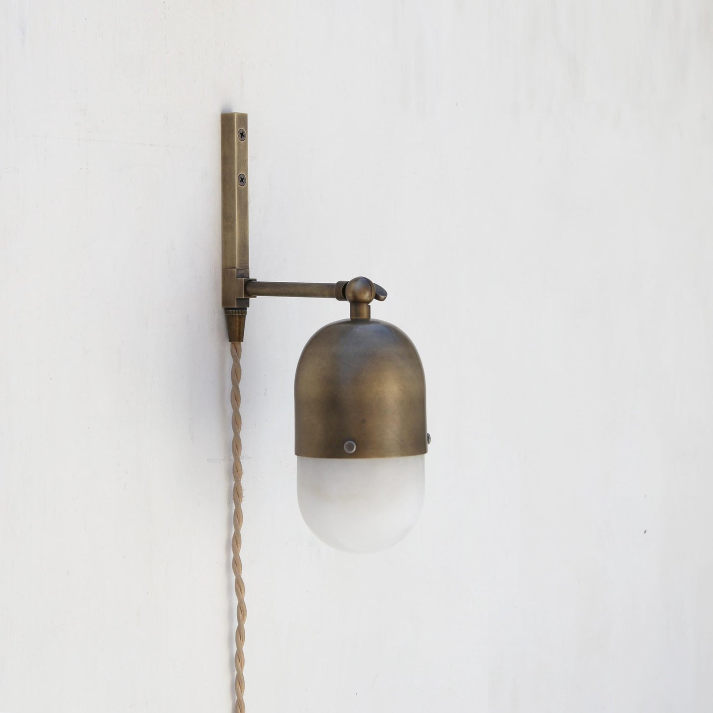 One-Light Plug-In Sconce with Brass Cap and Alabaster Shade