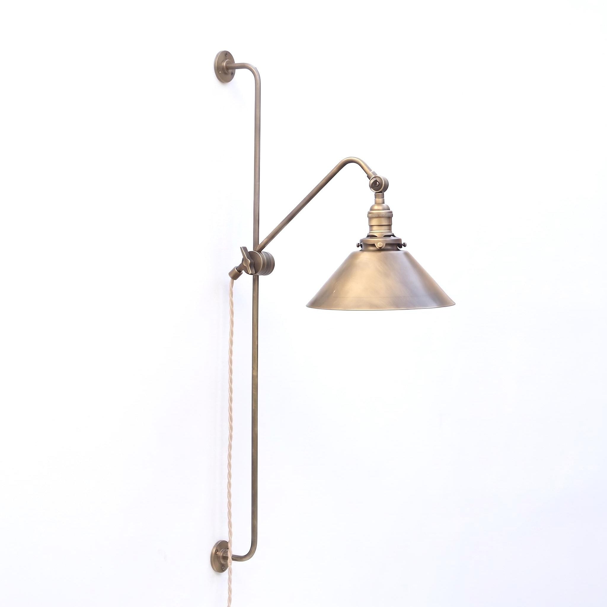 One-Light Plug-In Sliding Rail Wall Sconce with Brass Cone