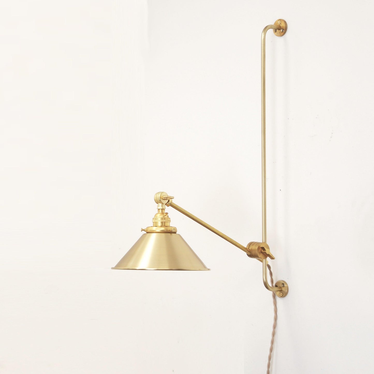 One-Light Plug-In Sliding Rail Wall Sconce with Brass Cone