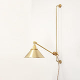 One-Light Plug-In Sliding Rail Wall Sconce with Brass Cone