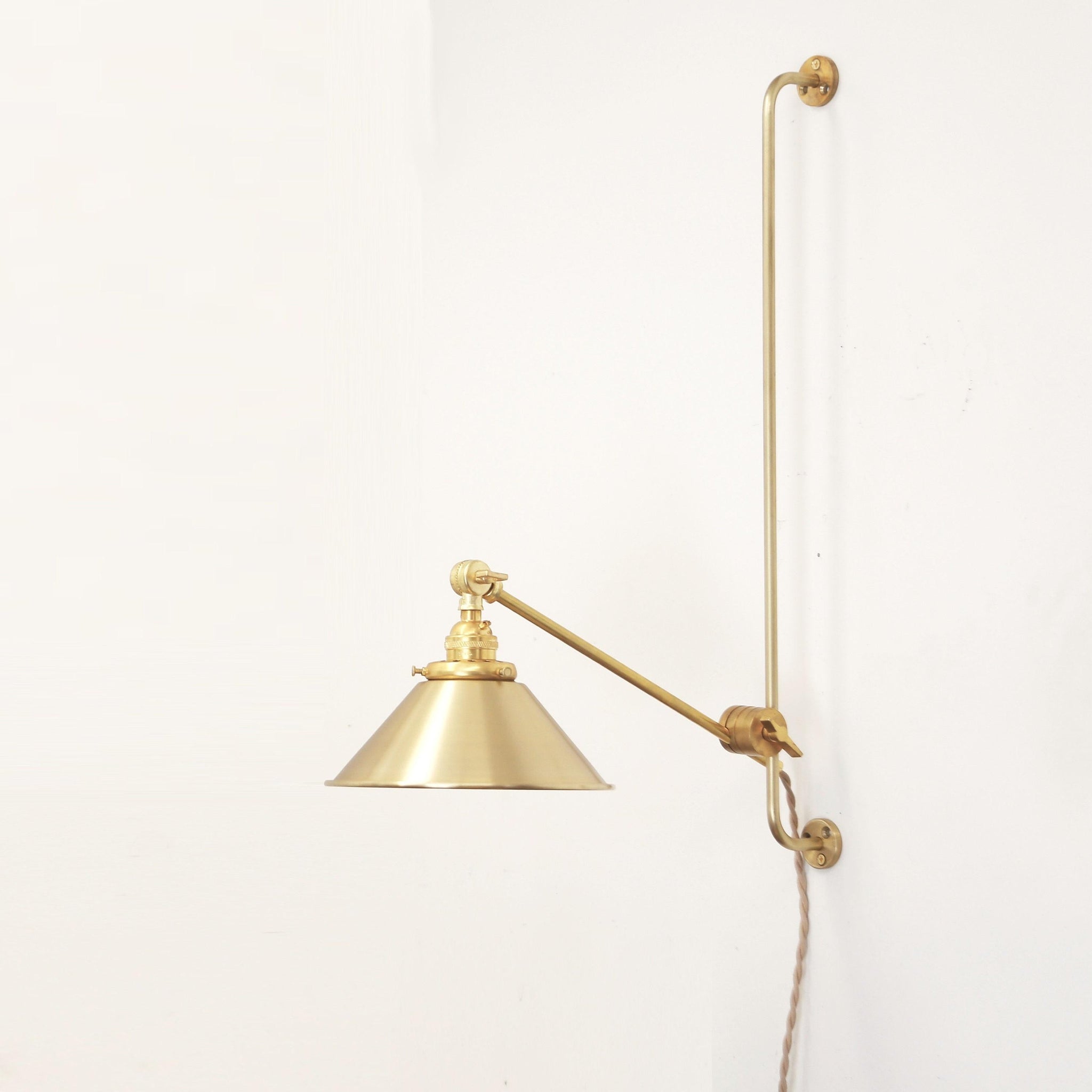 One-Light Plug-In Sliding Rail Wall Sconce with Brass Cone