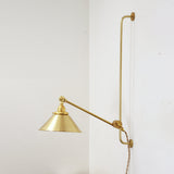 One-Light Plug-In Sliding Rail Wall Sconce with Brass Cone