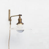 One-Light Plug-In Swing-Arm Sconce with Flared Cream Shade
