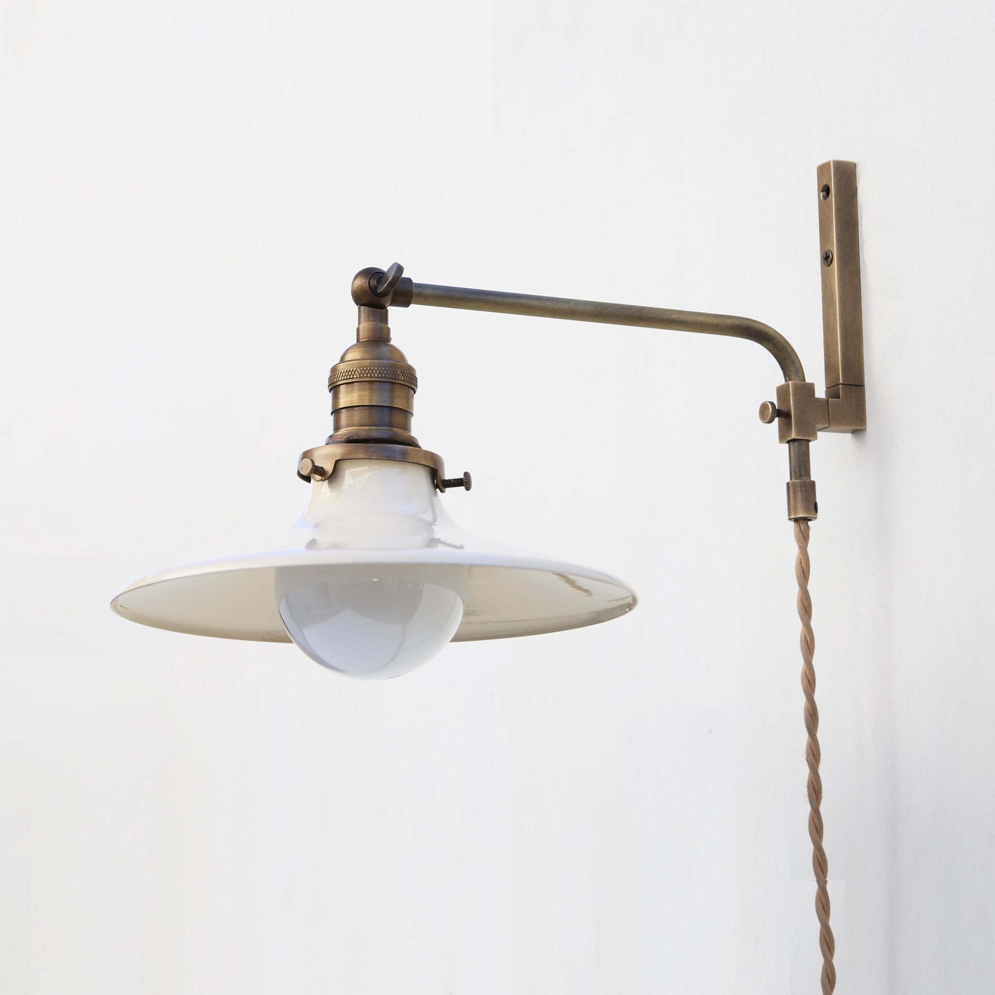 One-Light Plug-In Swing-Arm Sconce with Flared Cream Shade