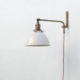 One-Light Plug-In Swing Arm Wall Sconce with Enamel Dome Shade
