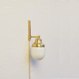 One-Light Plug-In Wall Sconce with Opal Glass Shade