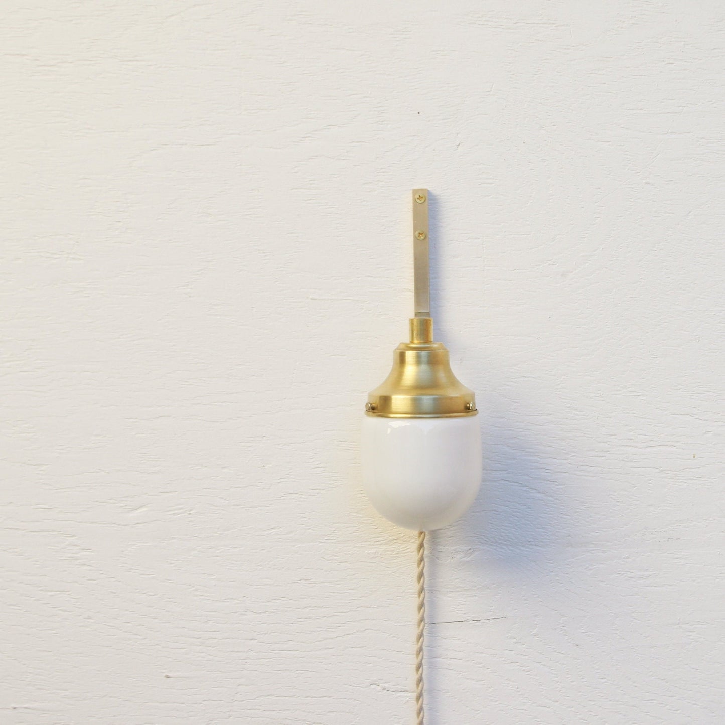 One-Light Plug-In Wall Sconce with Opal Glass Shade