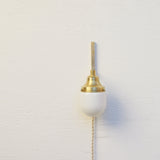 One-Light Plug-In Wall Sconce with Opal Glass Shade
