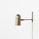 One-Light Plug-In Wall Sconce with Pivoting Brass Cylinder