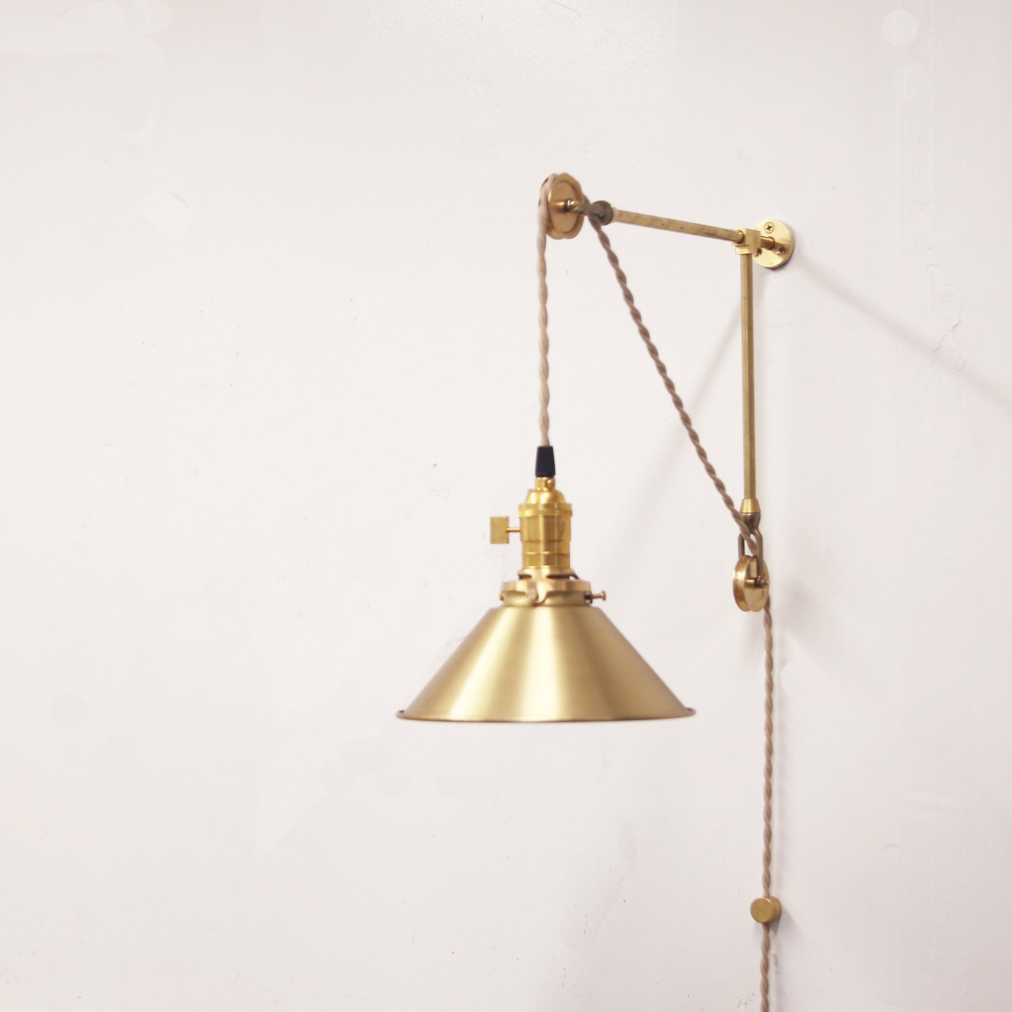 One-Light Pulley Wall Sconce with Brass Cone Shade