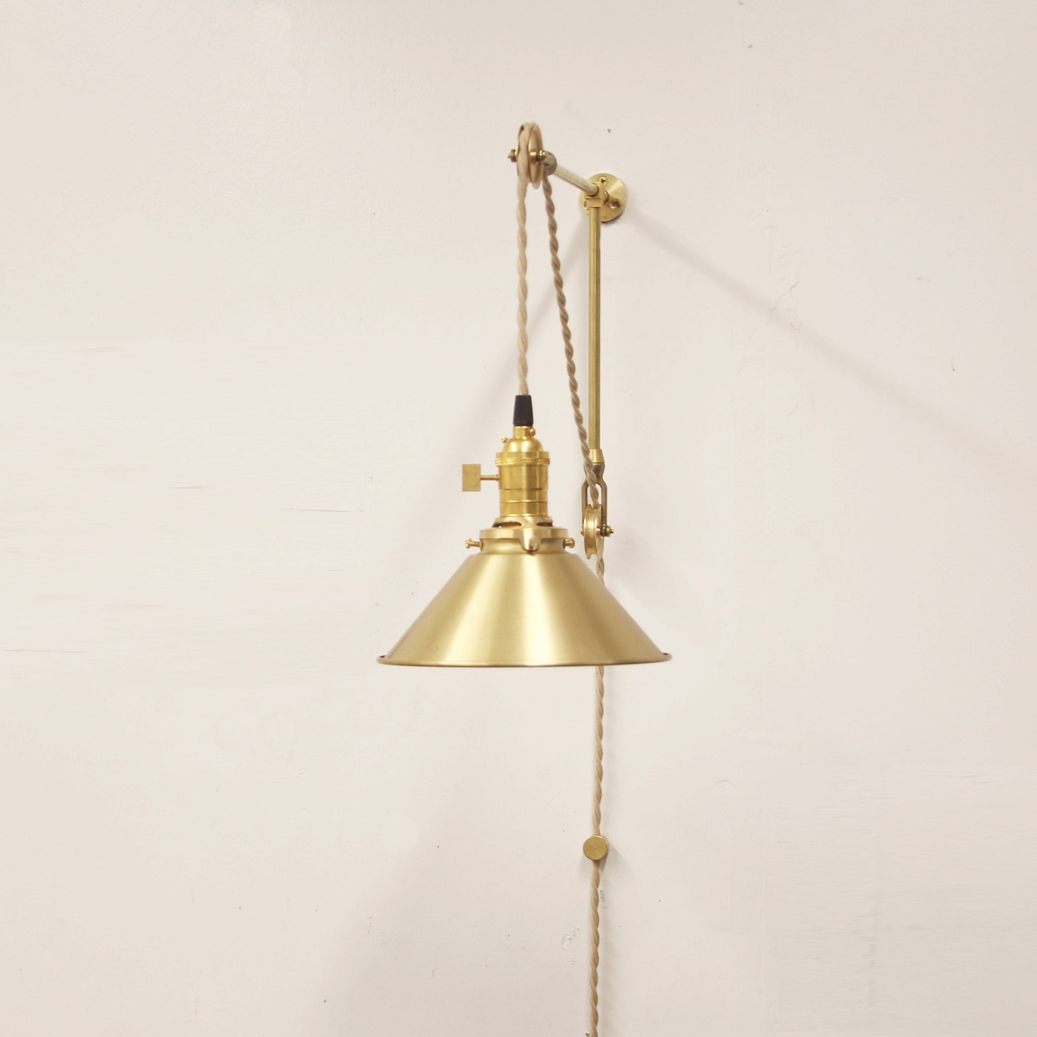 One-Light Pulley Wall Sconce with Brass Cone Shade