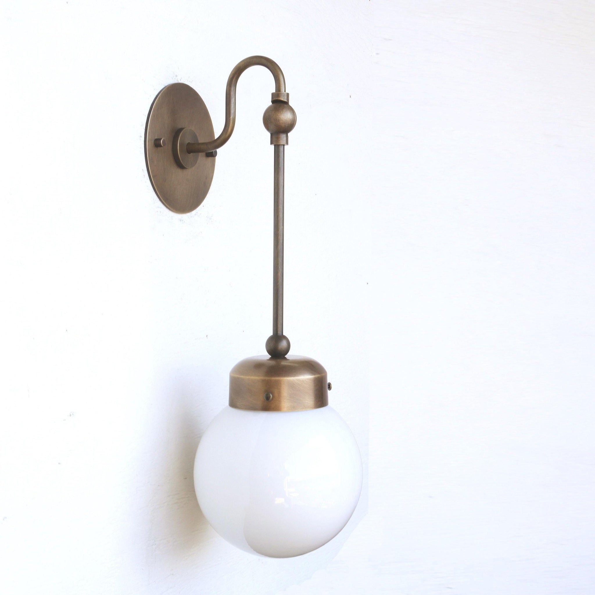 One-Light Rod-Drop Wall Sconce with Opal Globe