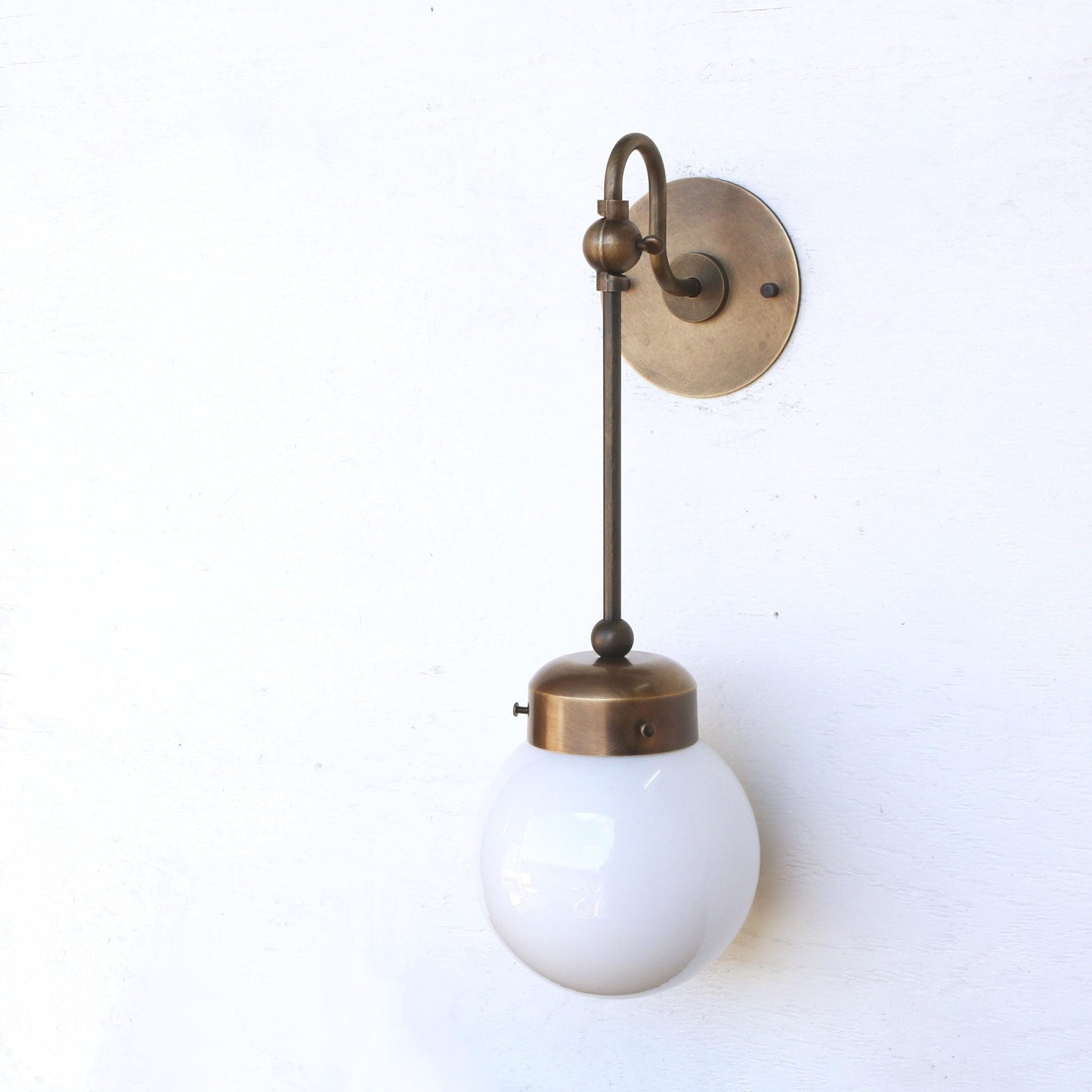 One-Light Rod-Drop Wall Sconce with Opal Globe
