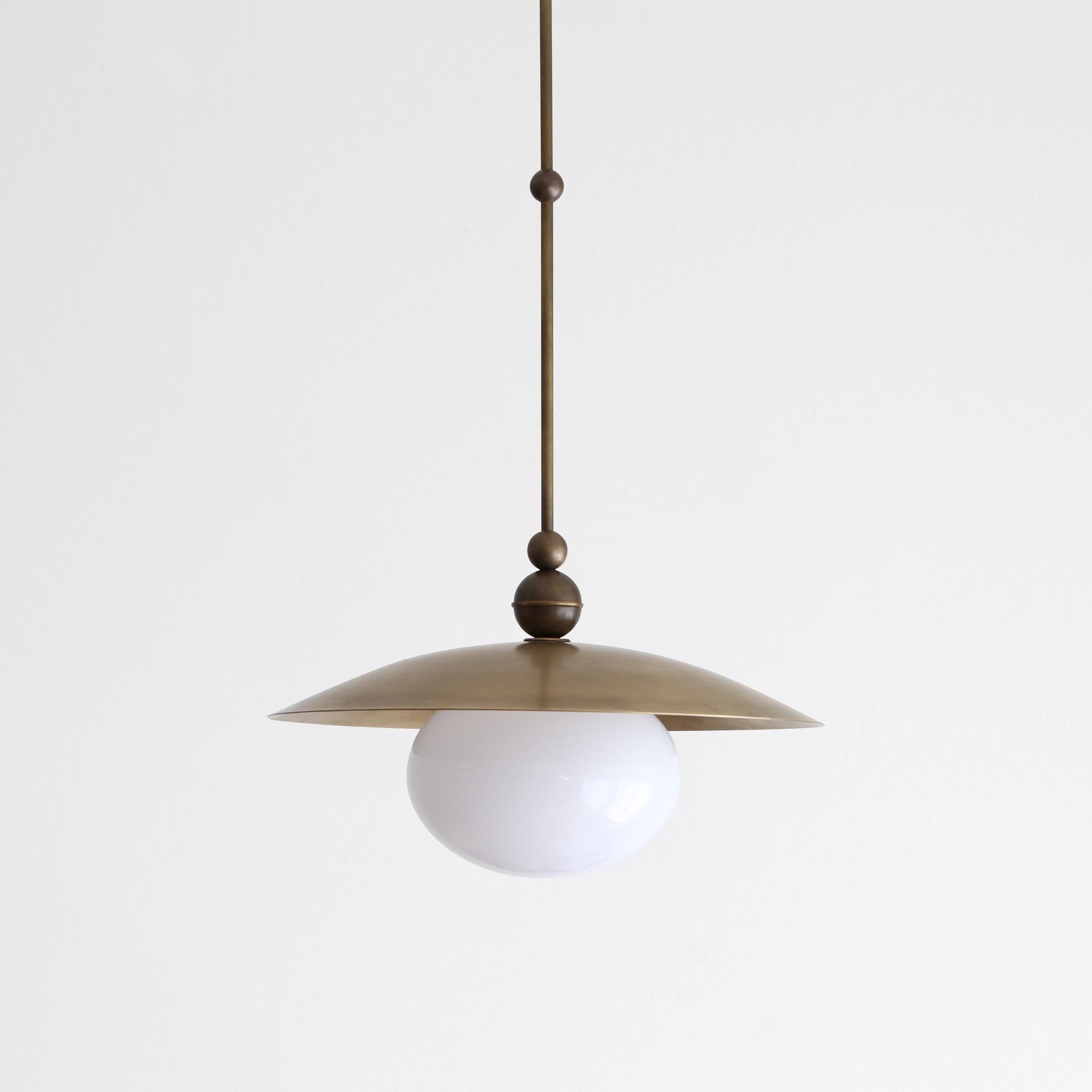 One-Light Rod-Hung Brass Dome Pendant with Opal Glass Globe
