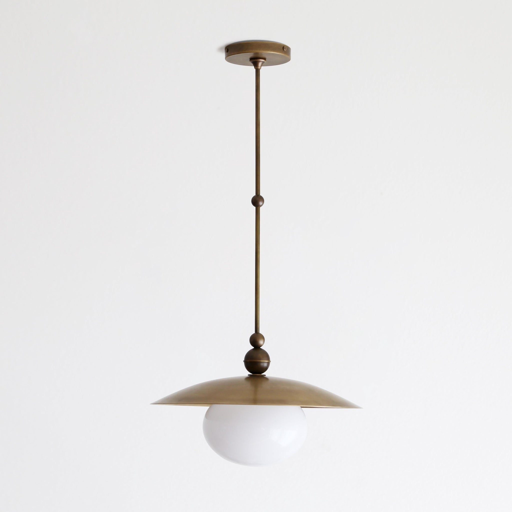 One-Light Rod-Hung Brass Dome Pendant with Opal Glass Globe