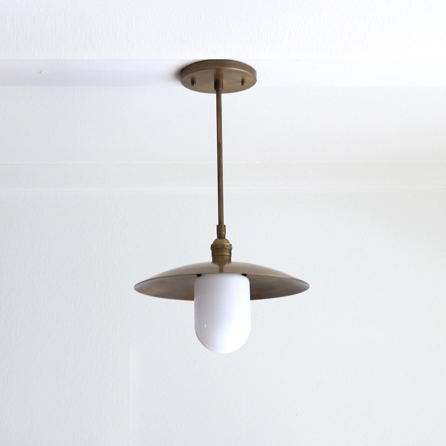 One-Light Stem Pendant with Brass Disc Shade