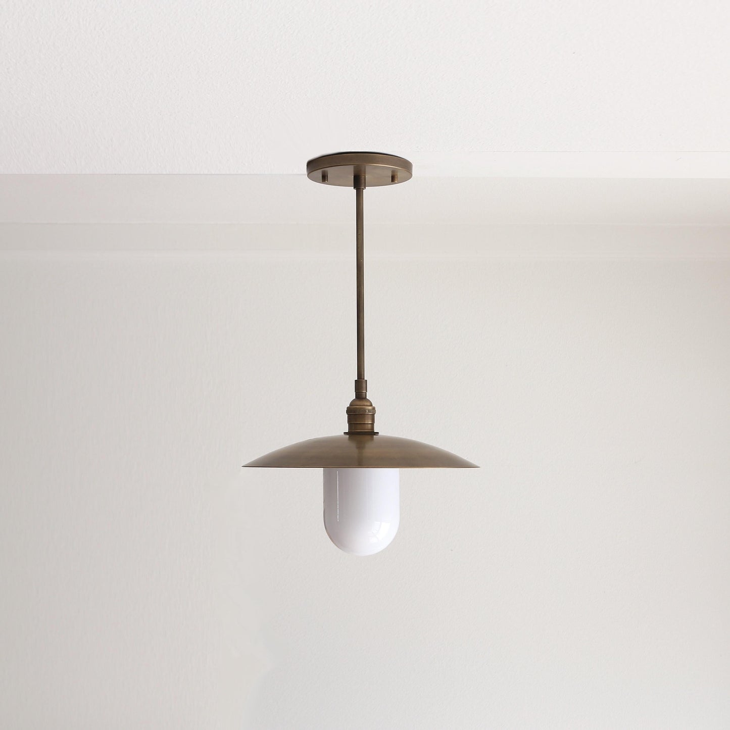 One-Light Stem Pendant with Brass Disc Shade