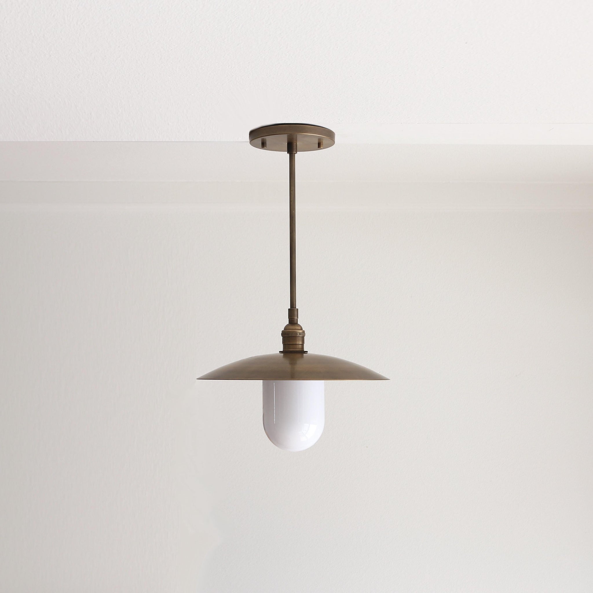 One-Light Stem Pendant with Brass Disc Shade