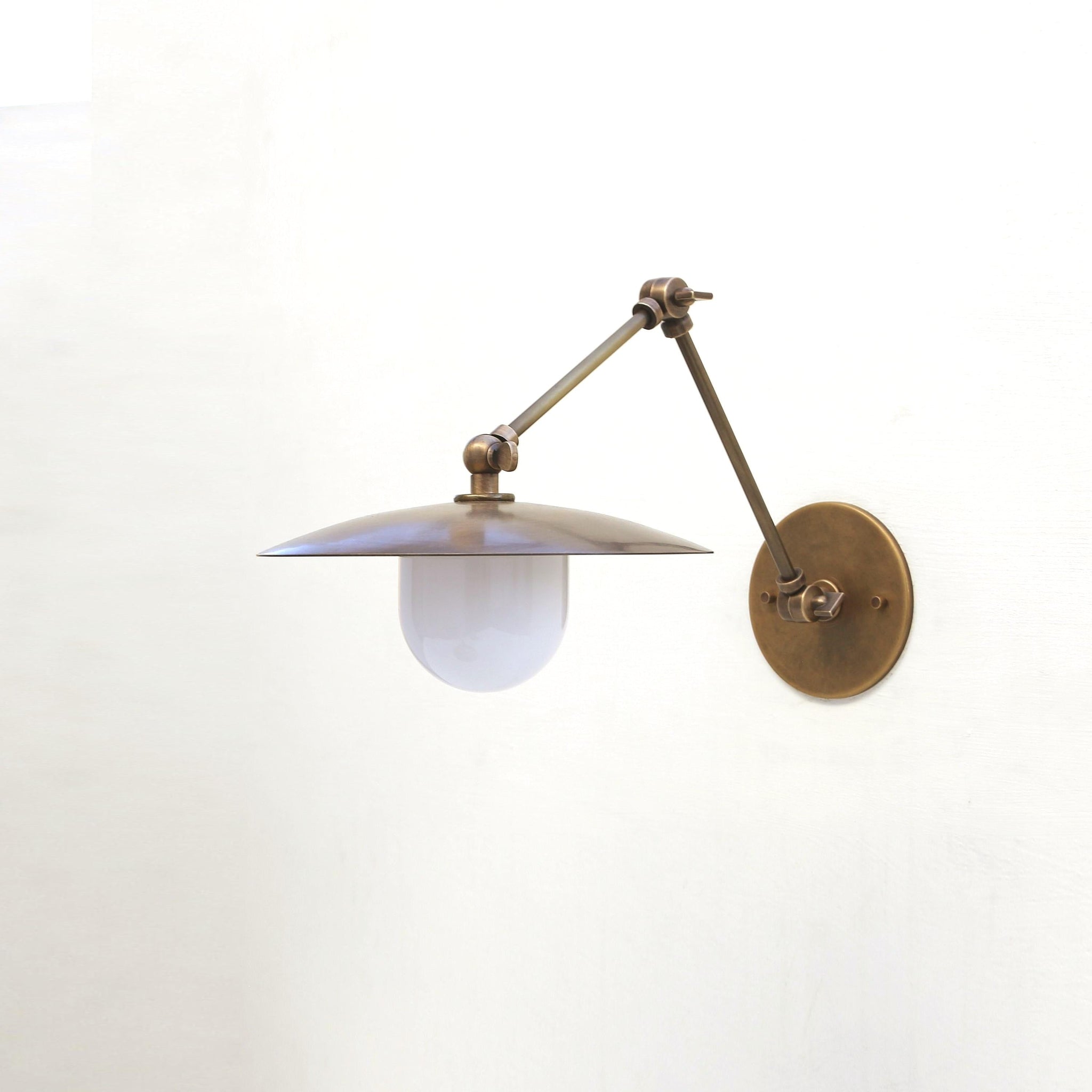 One-Light Swing-Arm Sconce with Brass Disc Shade