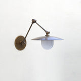 One-Light Swing-Arm Sconce with Brass Disc Shade