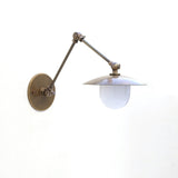 One-Light Swing-Arm Sconce with Brass Disc Shade