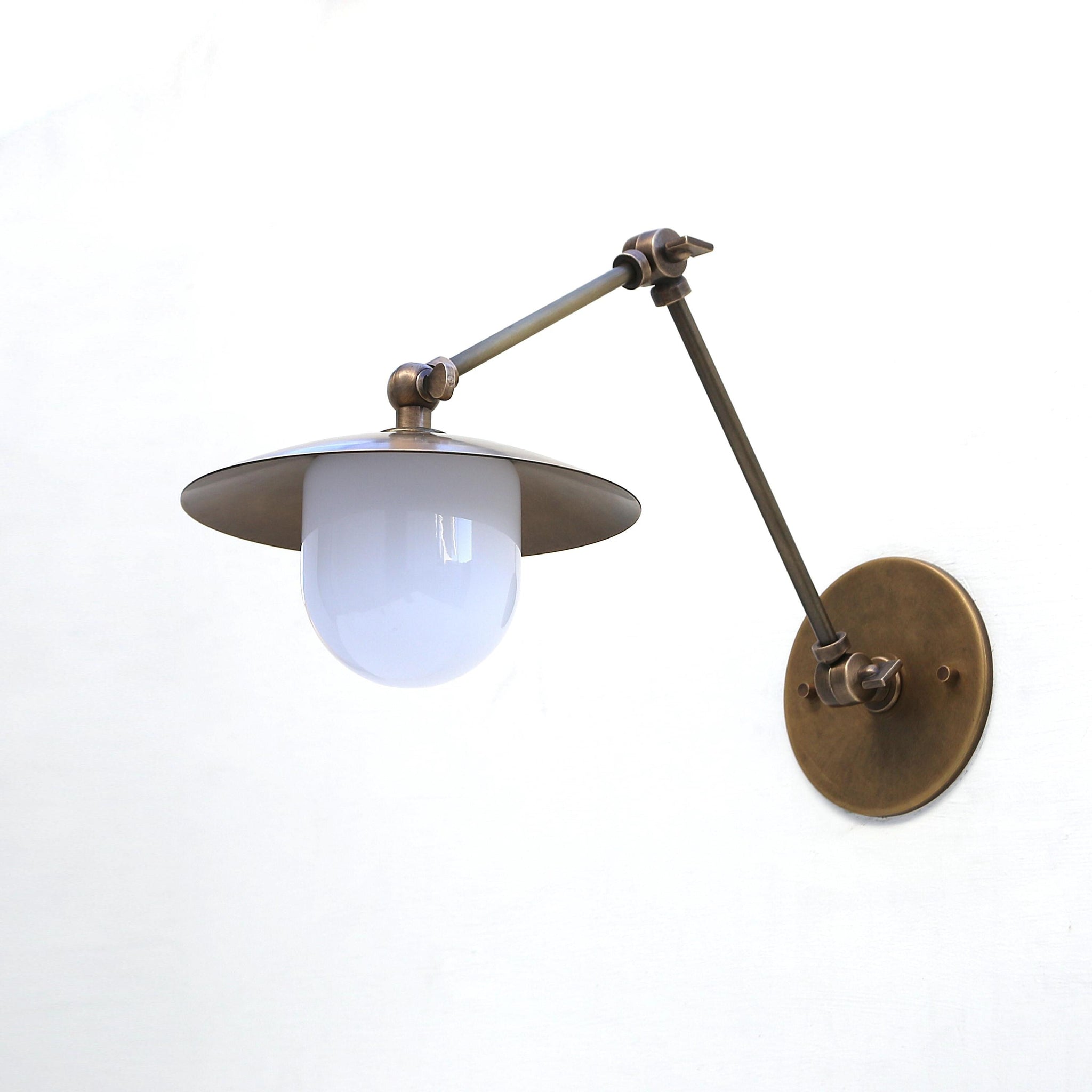 One-Light Swing-Arm Sconce with Brass Disc Shade