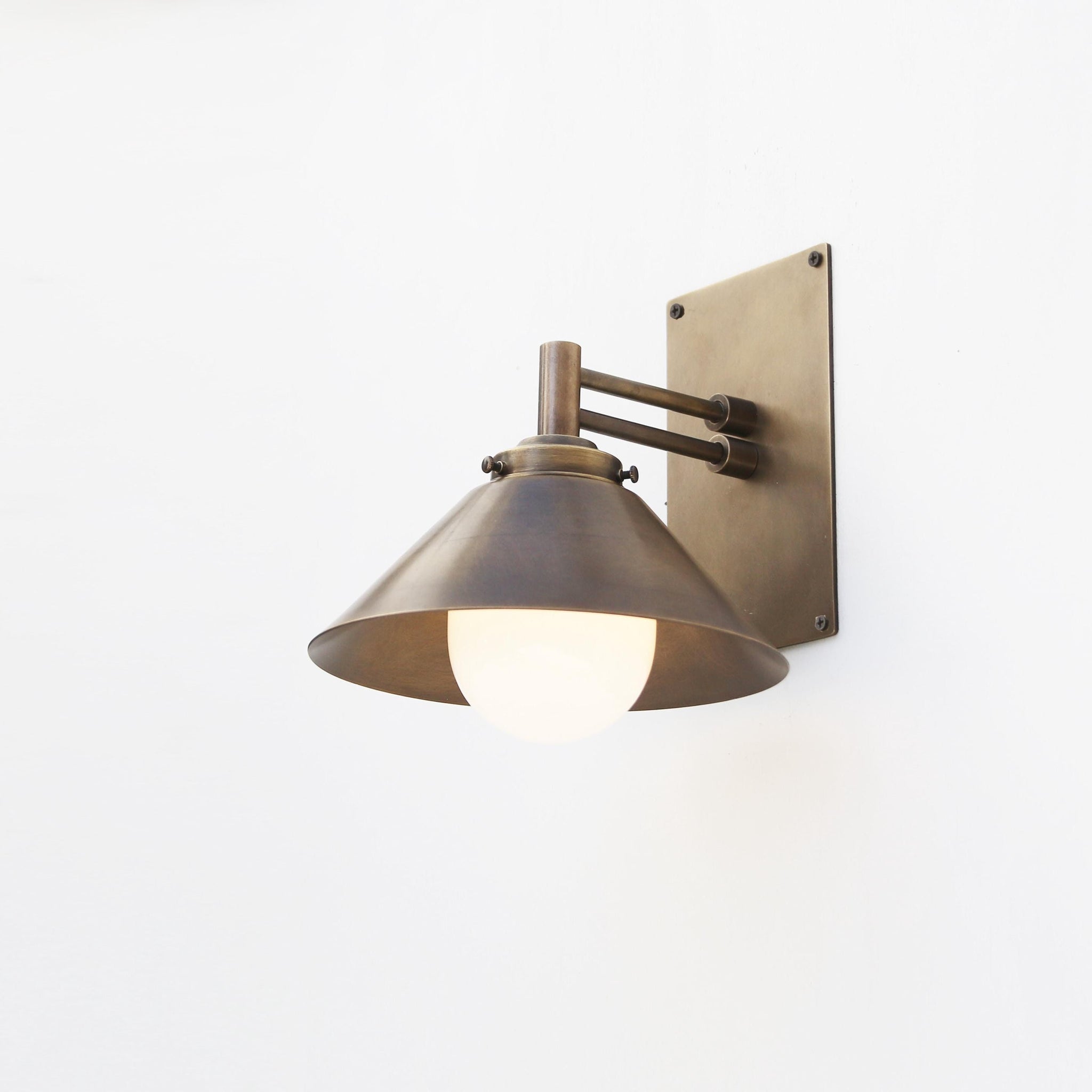One-Light Swing-Arm Wall Sconce with Brass Cone Shade