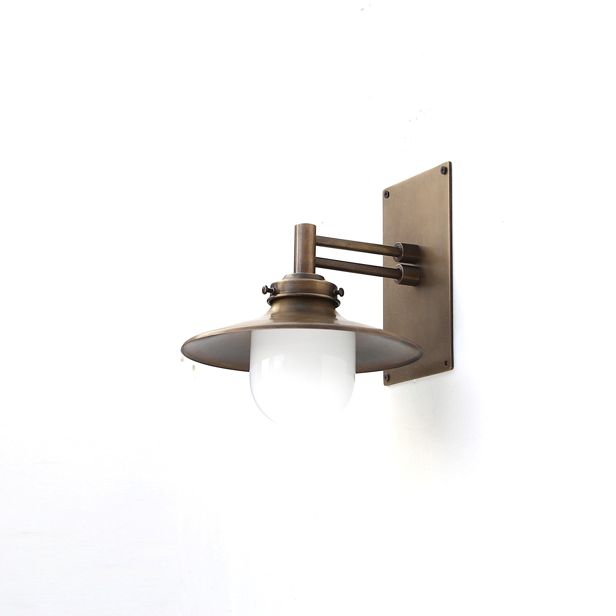 One-Light Swing-Arm Wall Sconce with Brass Coolie Shade