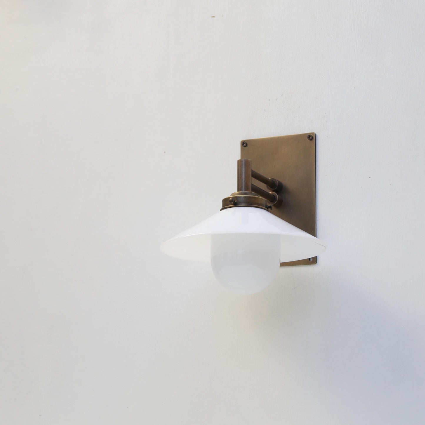 One-Light Swing-Arm Wall Sconce with Opal Glass Cone Shade