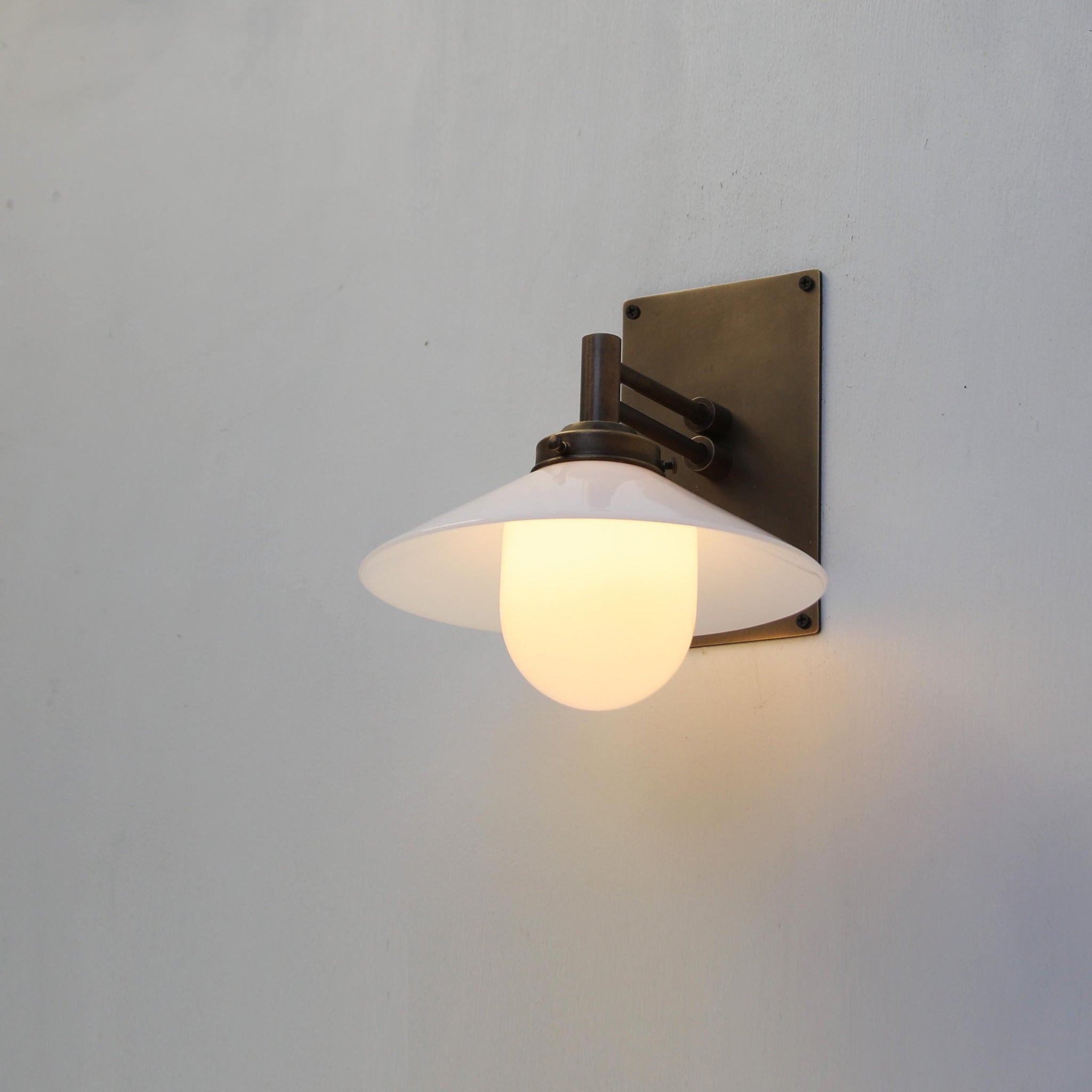 One-Light Swing-Arm Wall Sconce with Opal Glass Cone Shade