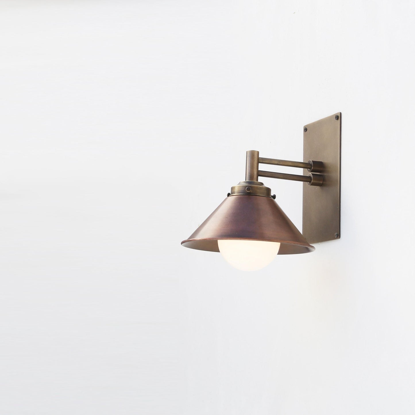One-Light Swing-Arm Wall Sconce with Weathered Copper Cone Shade