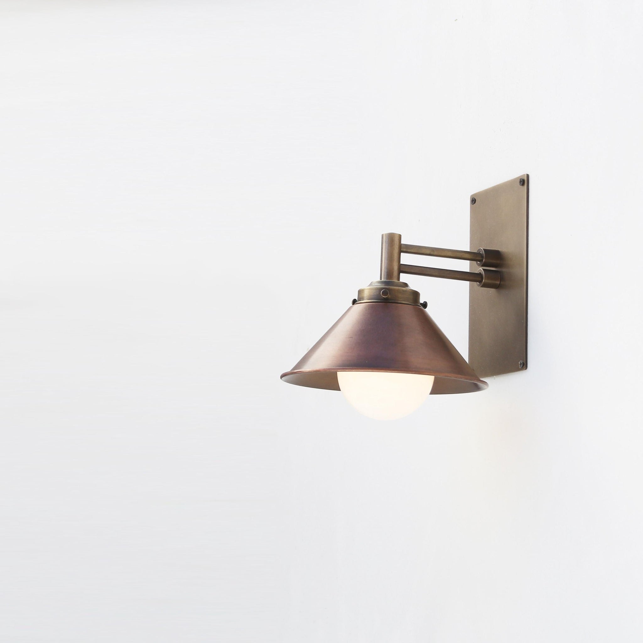 One-Light Swing-Arm Wall Sconce with Weathered Copper Cone Shade