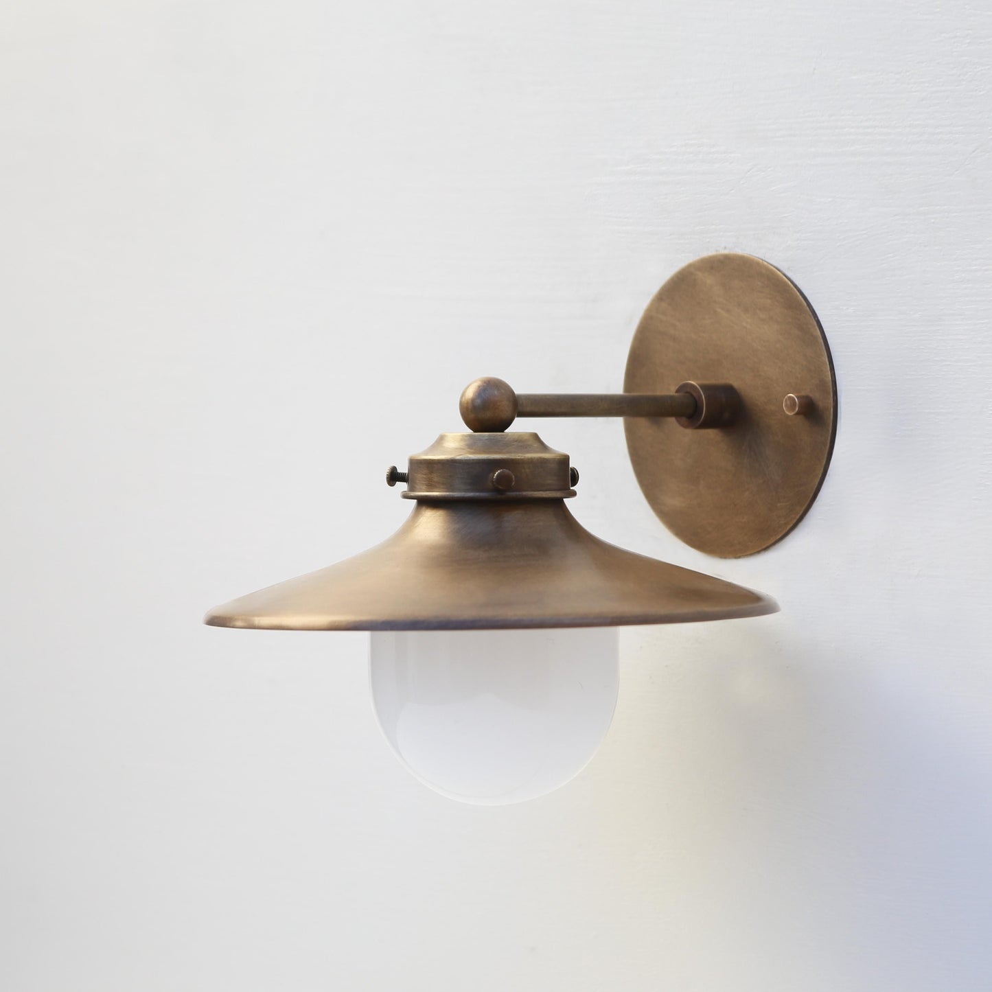 One-Light Wall Sconce with 9-Inch Brass Cone Shade