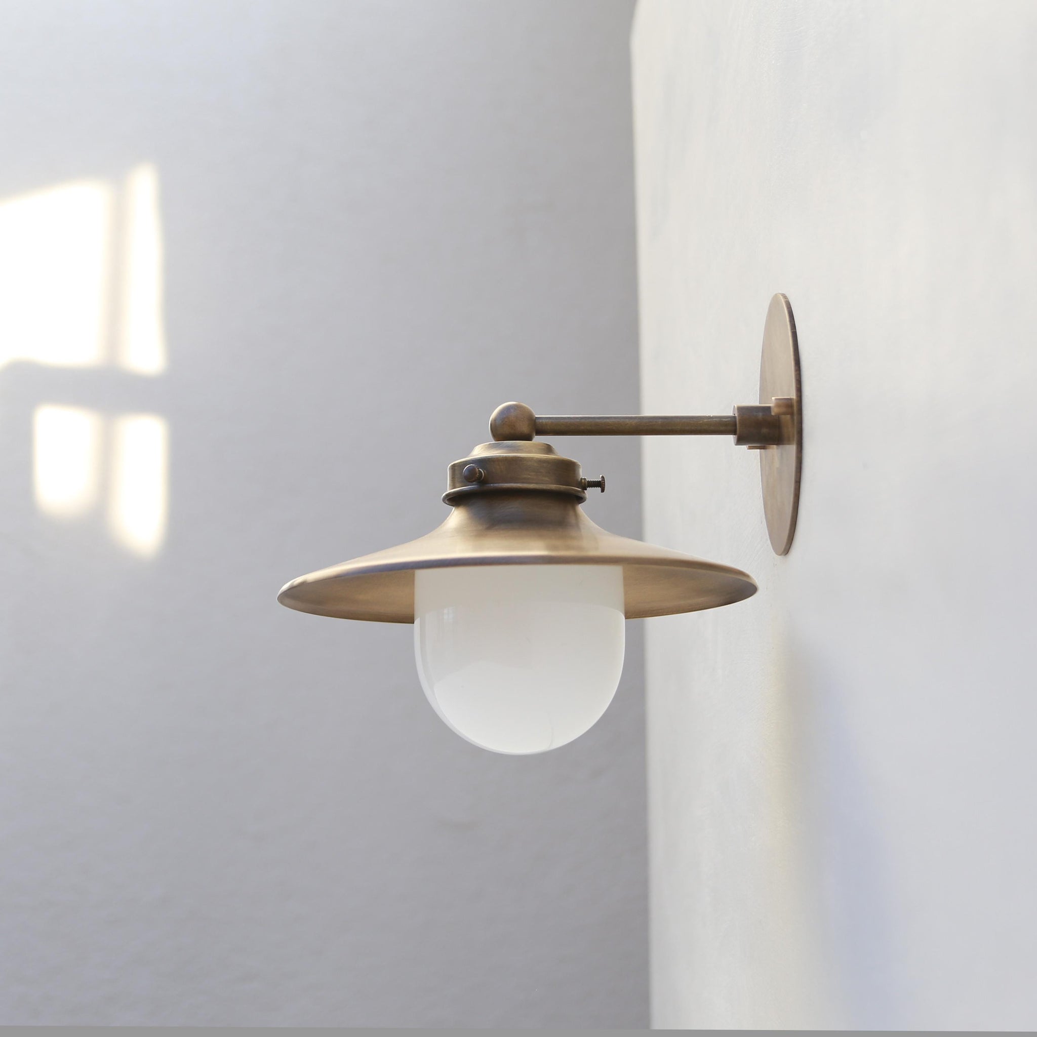 One-Light Wall Sconce with 9-Inch Brass Cone Shade