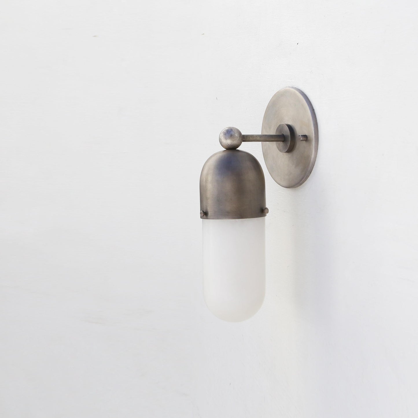 One-Light Wall Sconce with Brass Cap and Opal Glass Tube