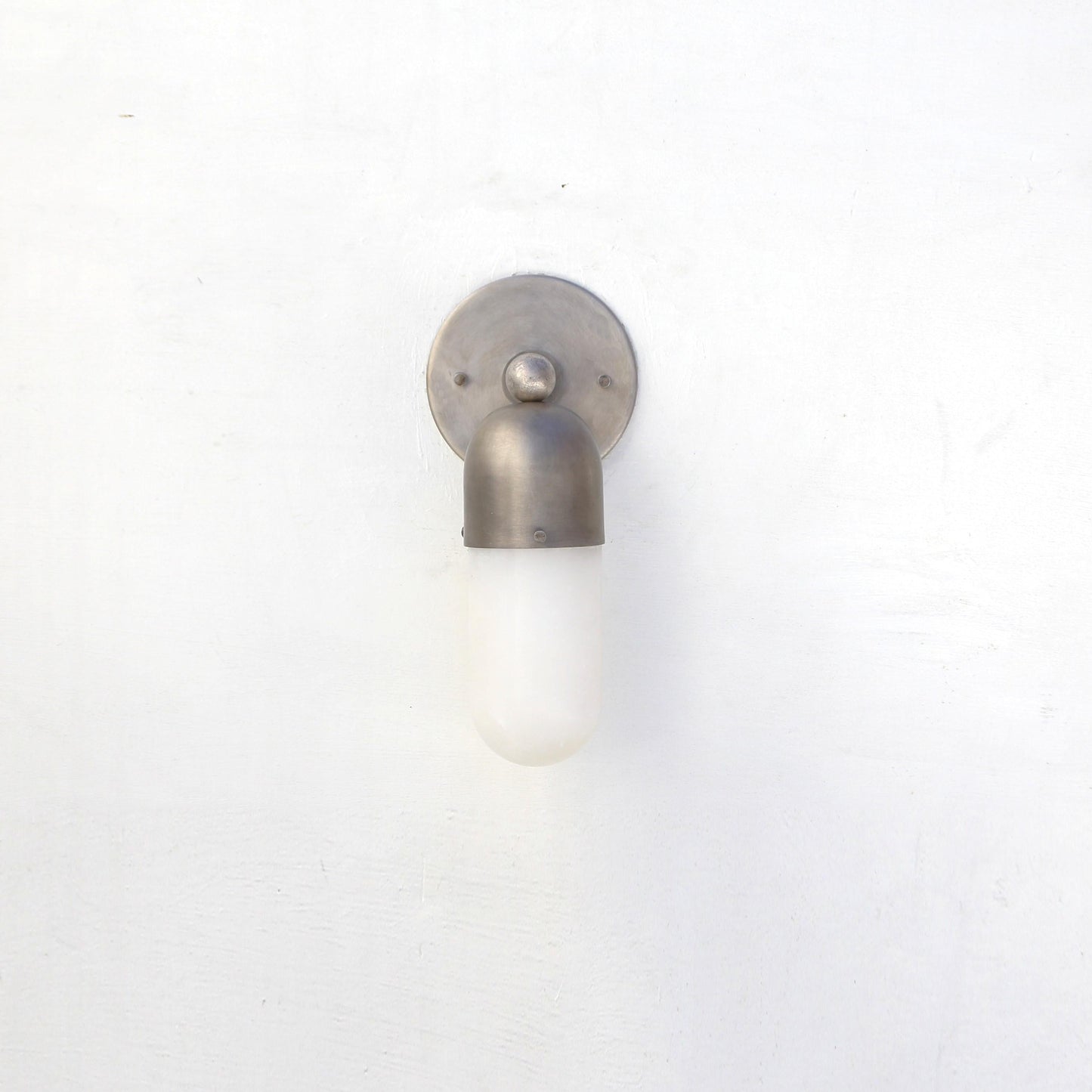 One-Light Wall Sconce with Brass Cap and Opal Glass Tube