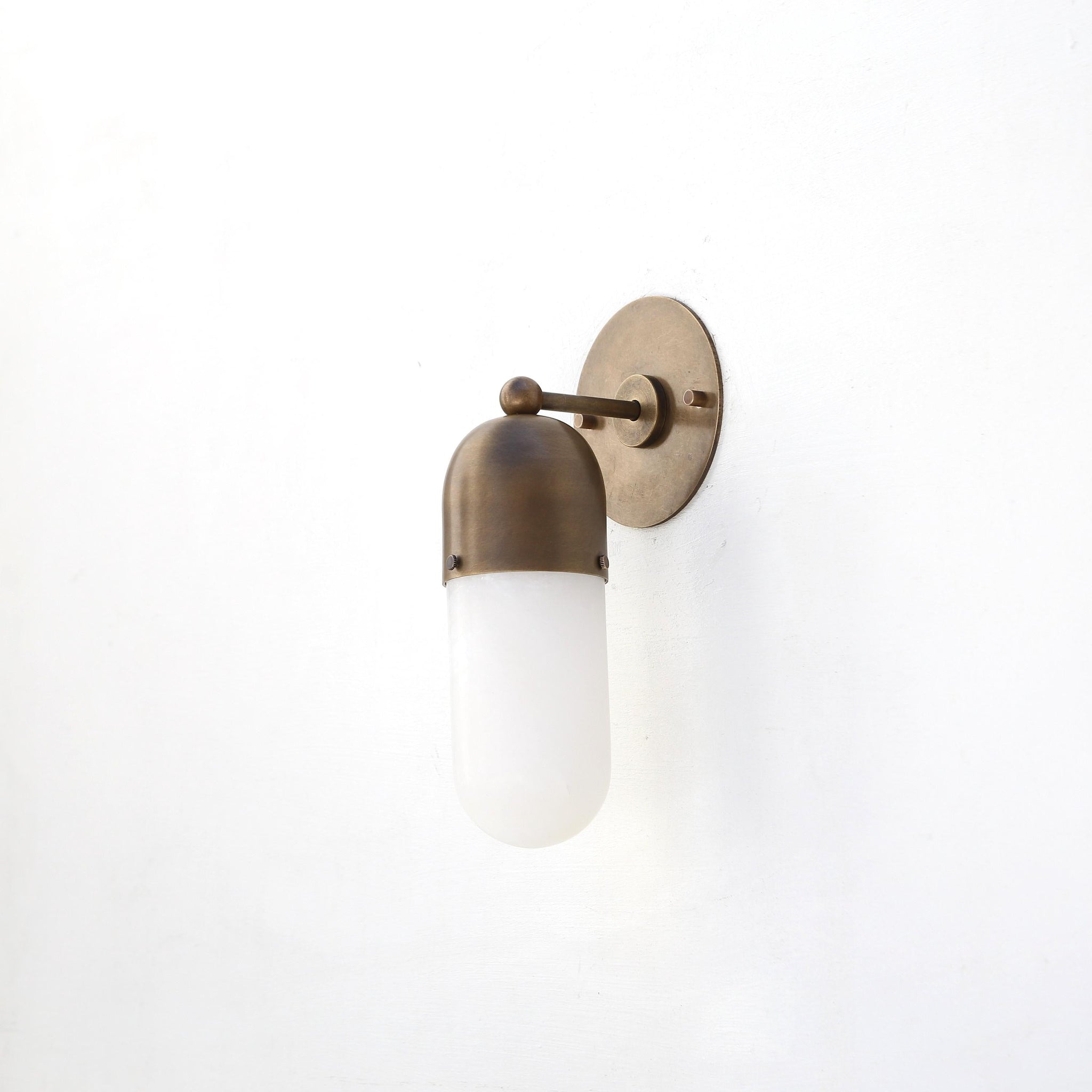One-Light Wall Sconce with Brass Cap and Opal Glass Tube